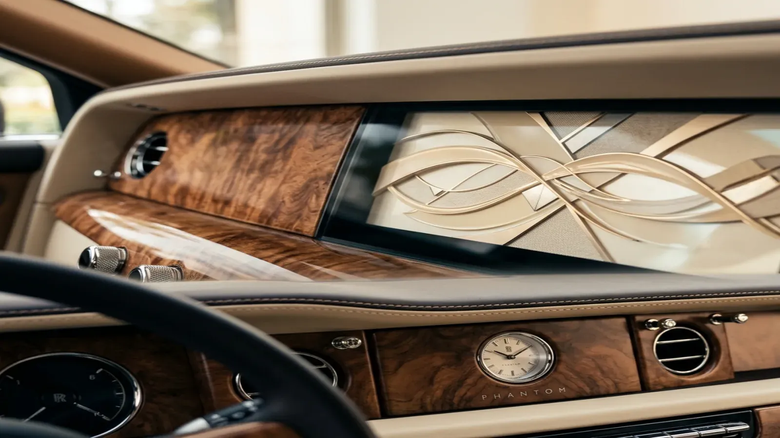 Craftsmen detailing a Rolls-Royce Phantom at Goodwood